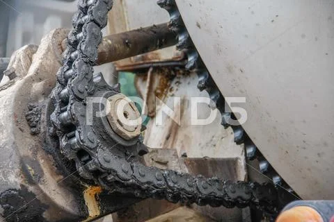 Old chain with propel roller Stock Photos