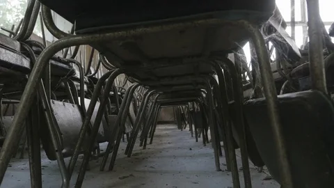 Old chairs stacked on top of each other. Bottom view Stock Footage 81803738