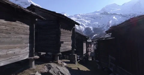 Old chalets in Saas Fee - Aerial 4K - Phantom 4 PRO Stock Footage 75055205