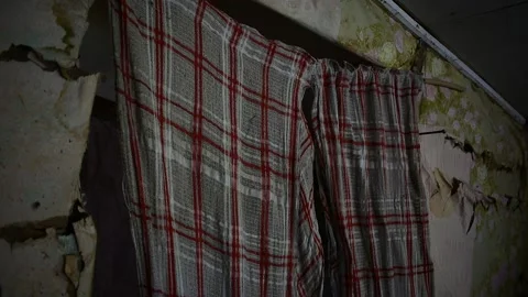 Old checkered curtains in a spooky interior Stock Footage 148256264