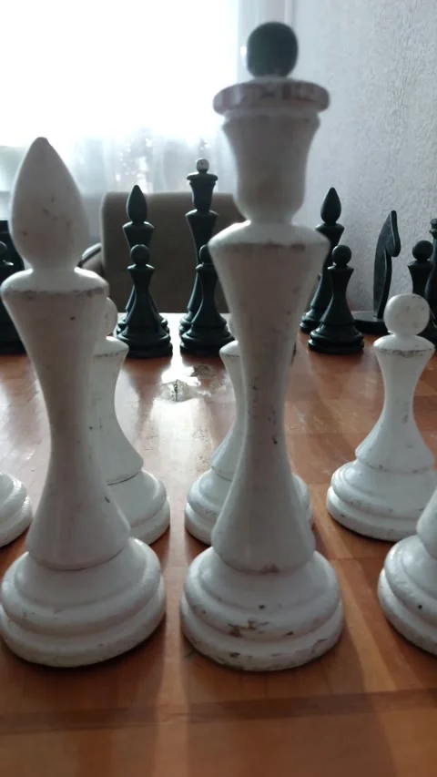 Old chess on an old chessboard Stock Footage 266190639