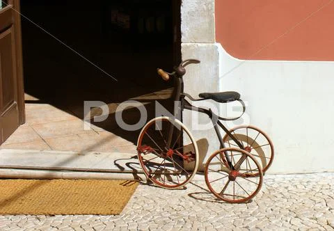 Old child's tricycle Stock Photos