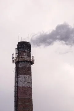 Old chimneys on sky background Stock Photos