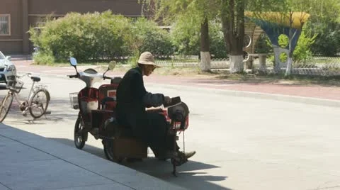 Old Chinese Knife Grinder Stock Footage 11130398