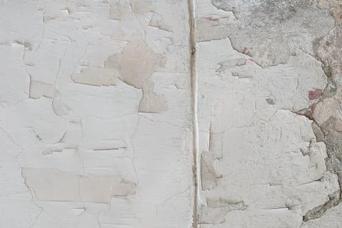 Old chipped paint on the concrete wall, white texture, background Stock Photos
