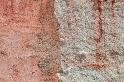 Old chipped plaster on the concrete wall, background texture Stock Photos