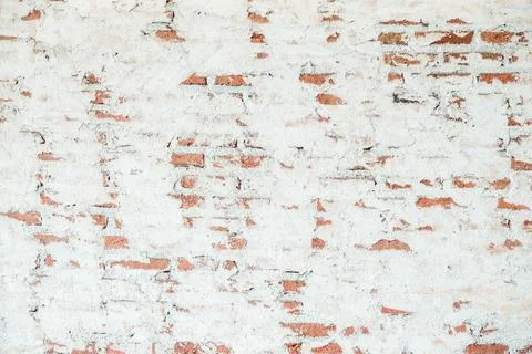 Old chipped white brick wall texture background. Vintage Wide Old Red White.. Stock Photos