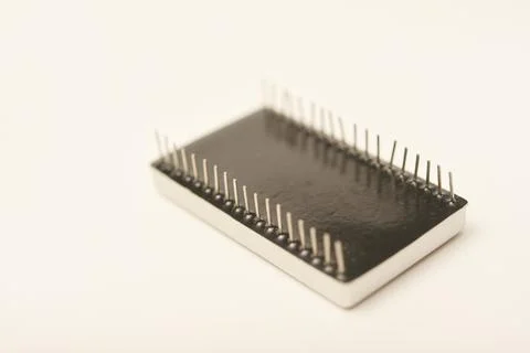 Old chips on a white background. Different electronic chips. Microcircuits .. Stock Photos