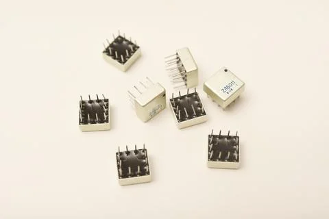 Old chips on a white background. Different electronic chips. Microcircuits .. Stock Photos