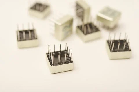 Old chips on a white background. Different electronic chips. Microcircuits .. Stock Photos