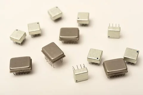 Old chips on a white background. Different electronic chips. Microcircuits .. Stock Photos