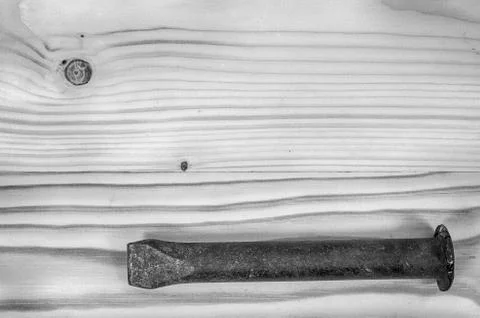 Old chisel on a wooden table. Stock Photos