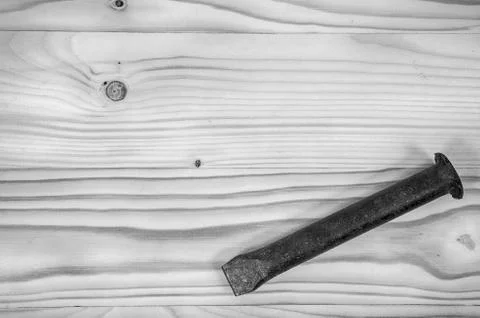 Old chisel on a wooden table. Stock Photos