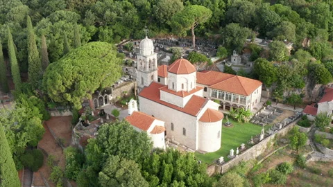 Old Christian monastery surrounded by green park and garden of Savina abbey Stock Footage 160140808