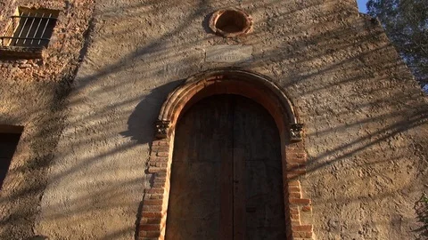 Old church Mare de Deu de les Arenes gate low angle 2 Stock Footage 106828973