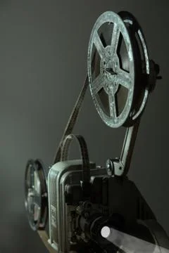 Old cinema projector on a dark background Stock Photos