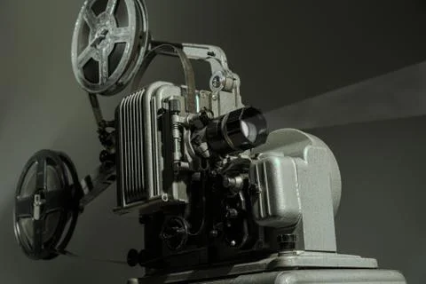 Old cinema projector on a dark background Stock Photos