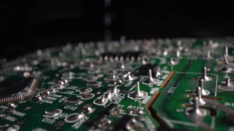 Old circuit board, soldered components, forward reveal 4k 動画素材 150258962