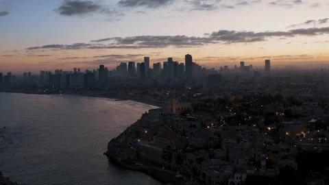 Old city Jaffa and Tel Aviv in Israel, morning sunrise 4k aerial drone skyline Stock Footage