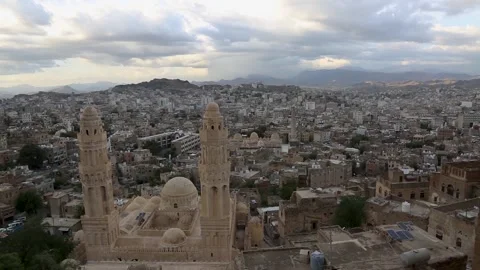 The old city of Taiz and the historic mosque and school of Al-Ashrafiyah appear Stock Footage 159972953