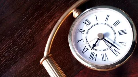 Old classic clock with Roman numerals Stock Photos