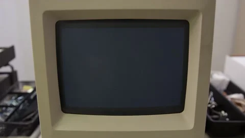 Old Classic Computer screen turns on quickly to desktop screen Stock Footage 131338726
