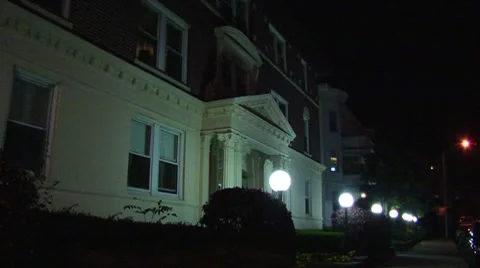 Old, classic structure apartment building at night 2 Stock Footage 8677456