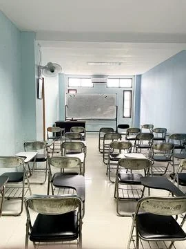 Old classroom with a lot of lecture chair,study room without student.concep.. Stock Photos