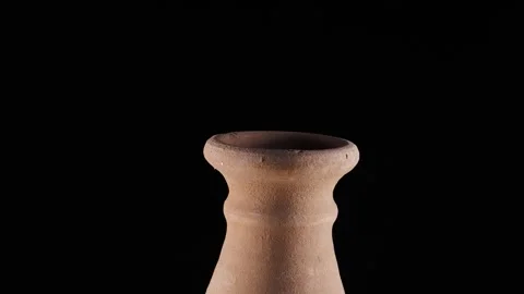 Old clay jug rotating on turntable 360 ​​degrees. 4k video capture Stock Footage 277497719