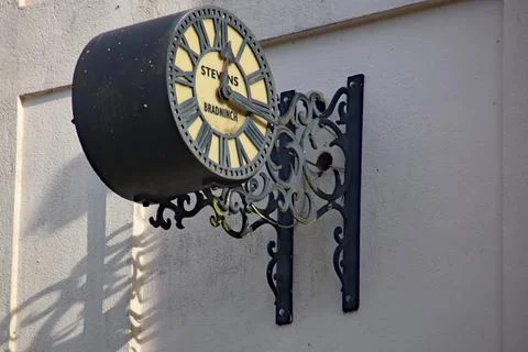 The old clock on the Bradninch Guildhall building Stock Photos