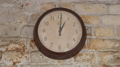 An Old Clock On A Brick Wall Ticks Away Stock Footage 239456590