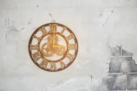 Old clock on the cement ground Stock Photos