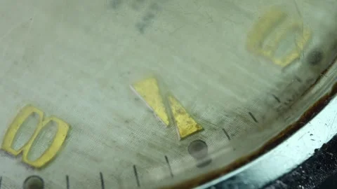 Old clock close up showing time with faded numbers Stock Footage 328665148