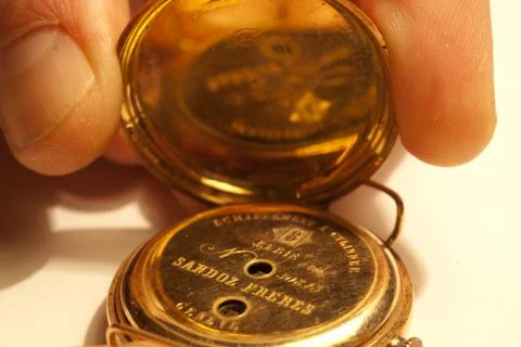 Old clock gold Stock Photos