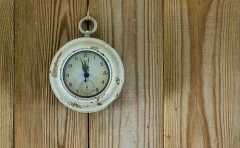 Old clock indicates five to twelve Stock Photos
