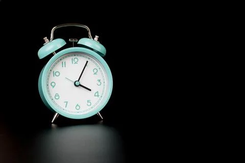 Old clock isolated on black background with space for text. Concept of time Stock Photos