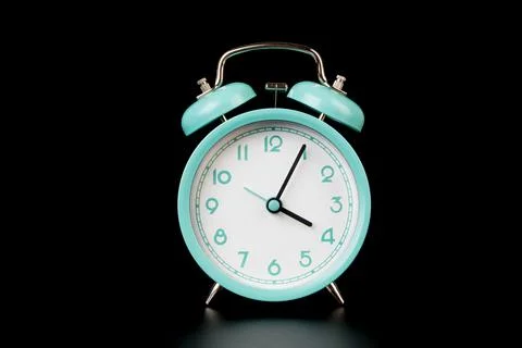 Old clock isolated on black background with space for text. Concept of time Stock Photos