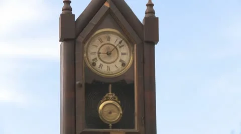 Old clock pendulum on the sky time concept Stock Footage 8960434