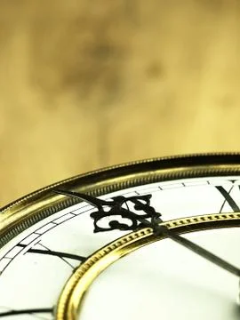 Old clock with roman numerals. Stock Photos