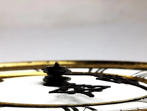 Old clock with roman numerals. Stock Photos