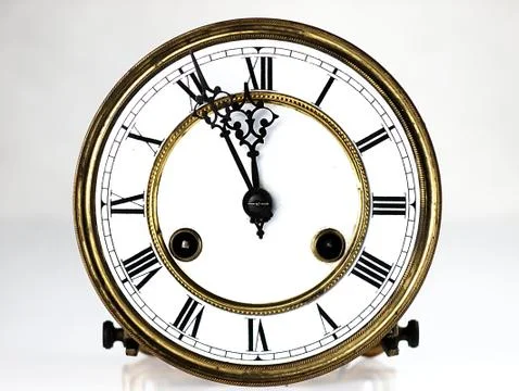 Old clock with roman numerals. Stockfoto's