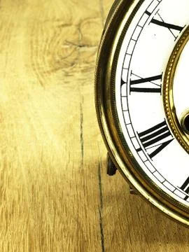 Old clock with roman numerals. Stock Photos