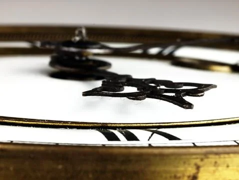 Old clock with roman numerals. Stock Photos