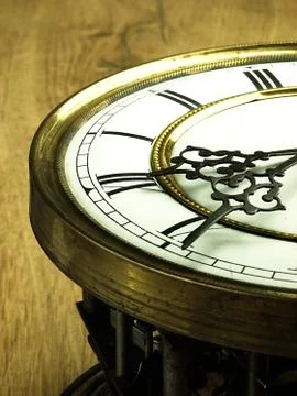 Old clock with roman numerals. Stock Photos