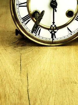 Old clock with roman numerals. Stock Photos