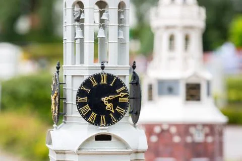 Old clock tower closeup, miniature scene Stock Photos