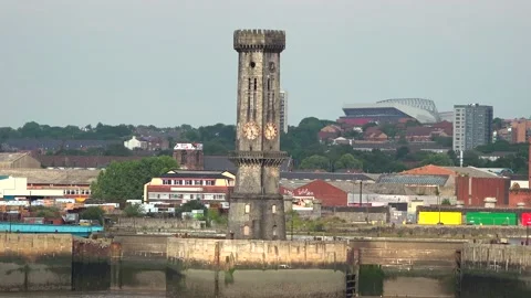 Old clock tower in the middle of the city by the sea Stock Footage 166142951