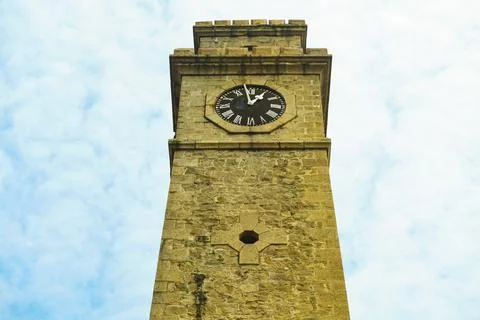 Old clock tower with roman numerals Stock Photos