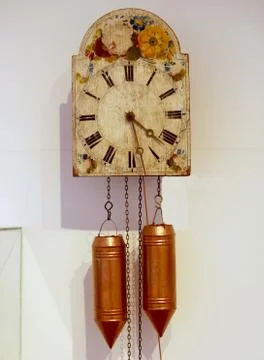 Old clock with weights Stock Photos