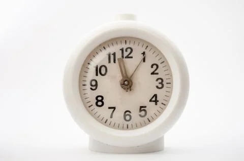Old clock on white background Foto stock